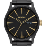 mirar educacion fisica Nixon centinela de acero inoxidable negro mate/oro 86XRT6