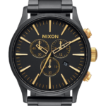 mirar educacion fisica Nixon crono centinela negro mate/oro 86XRT74