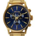 mirar educacion fisica Nixon crono centinela rayo de sol dorado/azul 86XRT76