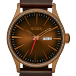 mirar educacion fisica Nixon cuero centinela bronce/negro 86XRT59