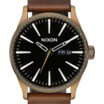 mirar educacion fisica Nixon cuero centinela latón/negro/marrón 86XRT49