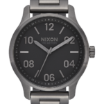 mirar educacion fisica Nixon patrulla bronce/negro 86XRT126