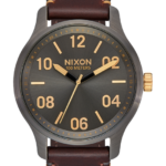mirar educacion fisica Nixon patrulla de cuero bronce/oro 86XRT104