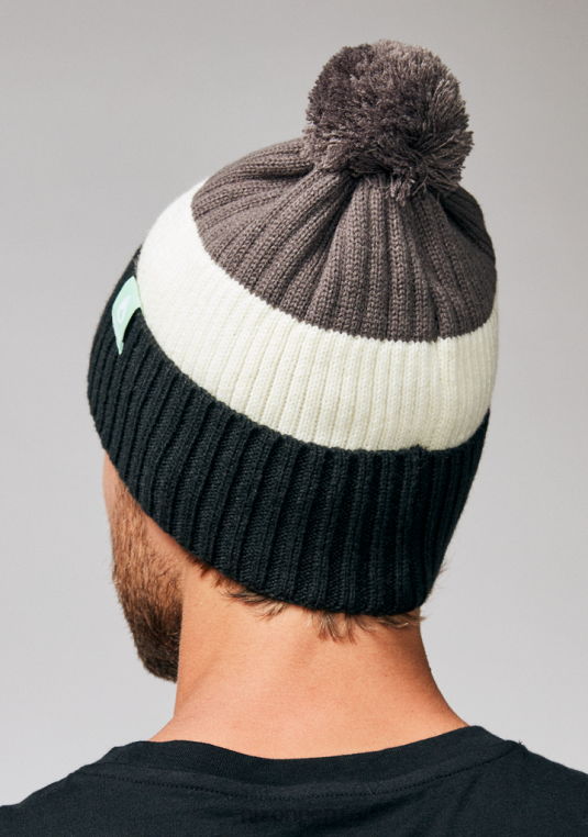 accesorios educacion fisica Nixon gorro schrader con pompón gris negro 86XRT381